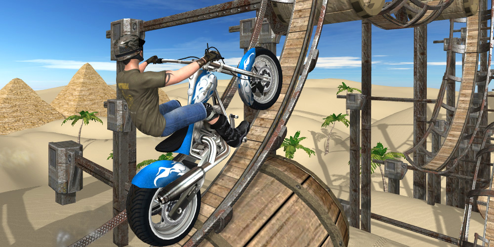 Rider in a chopper motorbike runnig on a curved ramp